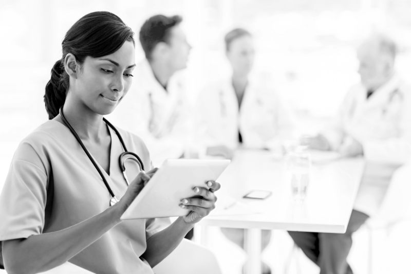 SINGLE-IMAGE_nurse-checking-tablet_aug24