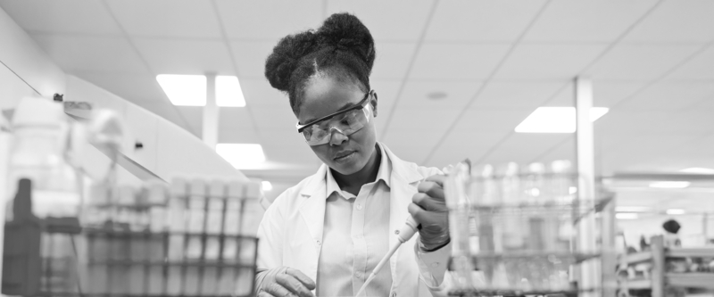 SINGLE-IMAGE_young-female-scientist-filling-chemical-through-pipette_mar25