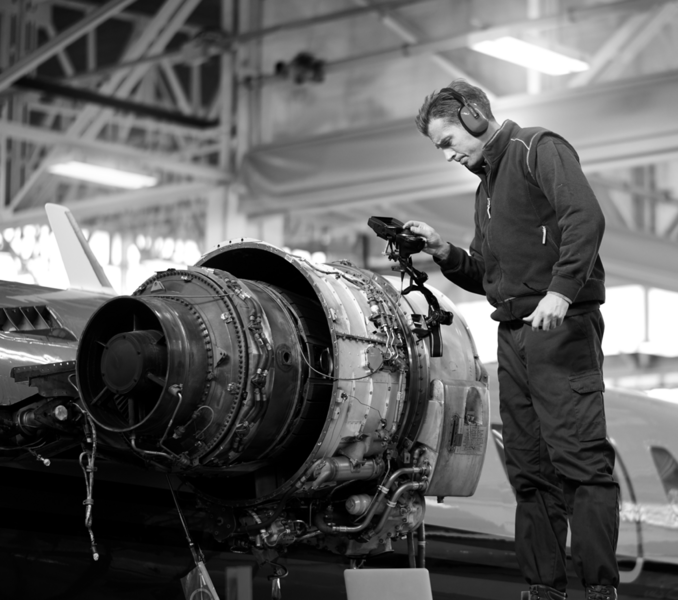 SINGLE-IMAGE_aerospace-engineer-checking-engine_feb24