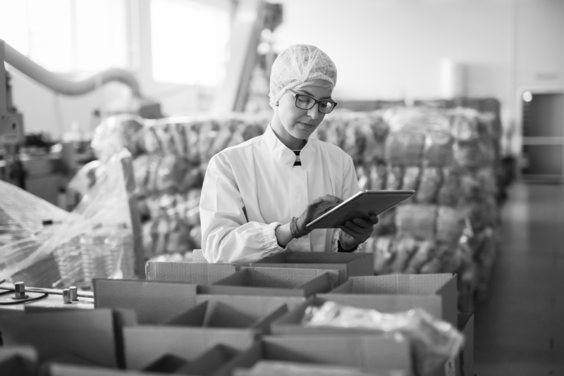 SINGLE-IMAGE_food-industry-woman-checking-stock-tablet_sept23