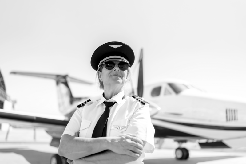 SINGLE-IMAGE_female-pilot-infront-of-plane_oct23