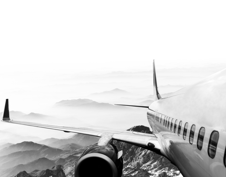 SINGLE-IMAGE_plane-in-flight-looking-back-over-wing_nov23