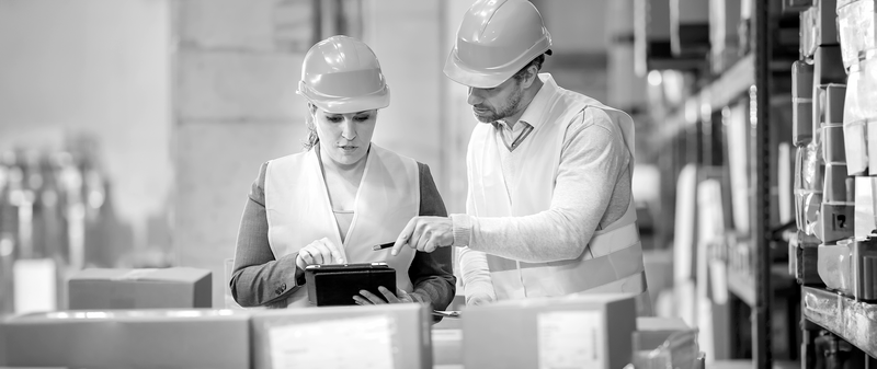 SINGLE-IMAGE_warehouse-employees-doing-inventory-check-in-tablet_aug24