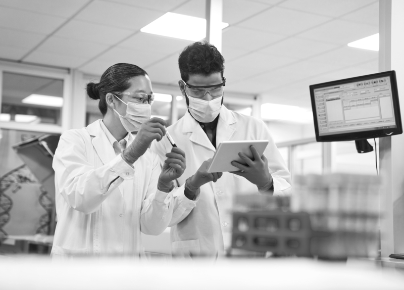 SINGLE-IMAGE_discussing-over-digital-tablet-at-laboratory_mar25