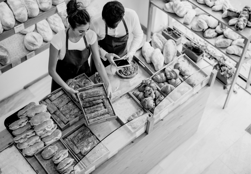 SINGLE-IMAGE_two-workers-with-tablet-in-bakery_nov23