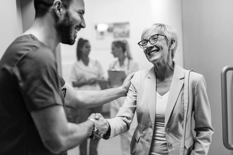 SINGLE-IMAGE_happy-senior-woman-shaking-hands-with-surgeon_aug24