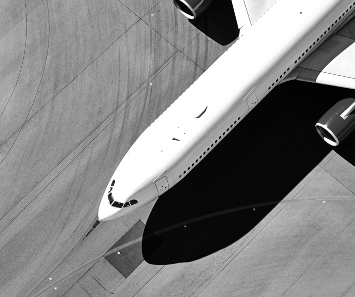 SINGLE-IMAGE_passenger-jet-runway-from-above_feb24