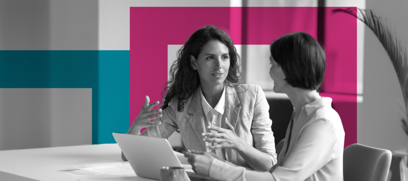 https://brandportal.ideagen.com/m/d6c5a9bccbc4a51/webimage-SINGLE-IMAGE_squares-two-business-women-sit-at-desk-laptop_may24.png